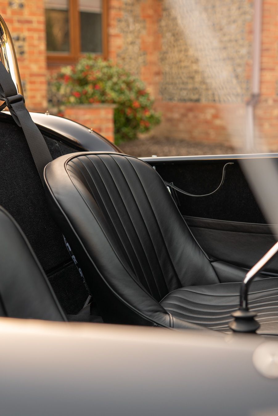 AC Cobra MKiv Mk IV mk4 4 retrim restoration respray repaint paint refurbish restore resto leather carpet black vaumol grained crushed how to trim redline engineering d:class dclass auto automotive golden hour seats steering wheel dashboard