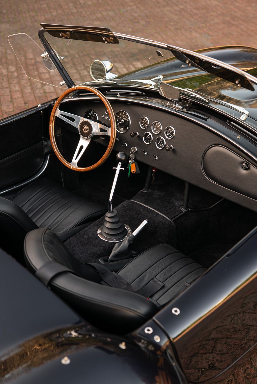 AC Cobra MKiv Mk IV mk4 4 retrim restoration respray repaint paint refurbish restore resto leather carpet black vaumol grained crushed how to trim redline engineering d:class dclass auto automotive golden hour seats steering wheel dashboard