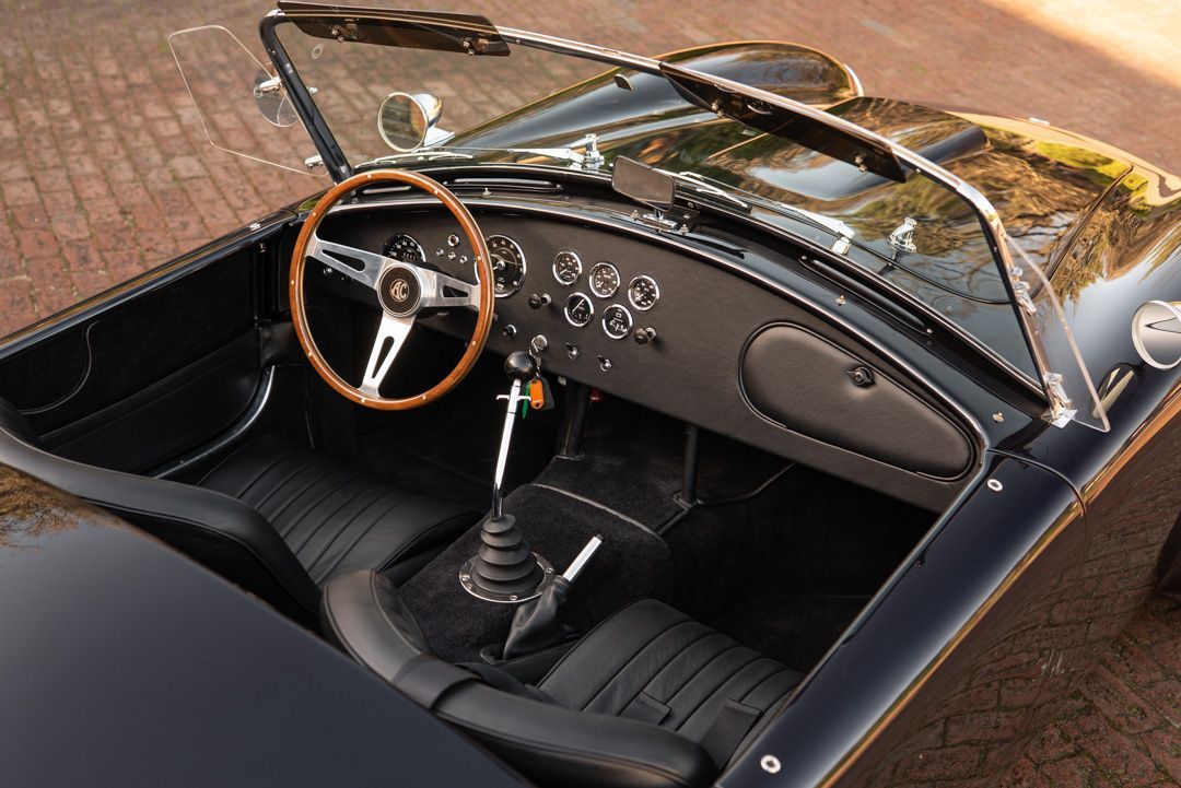 AC Cobra MKiv Mk IV mk4 4 retrim restoration respray repaint paint refurbish restore resto leather carpet black vaumol grained crushed how to trim redline engineering d:class dclass auto automotive golden hour seats steering wheel dashboard