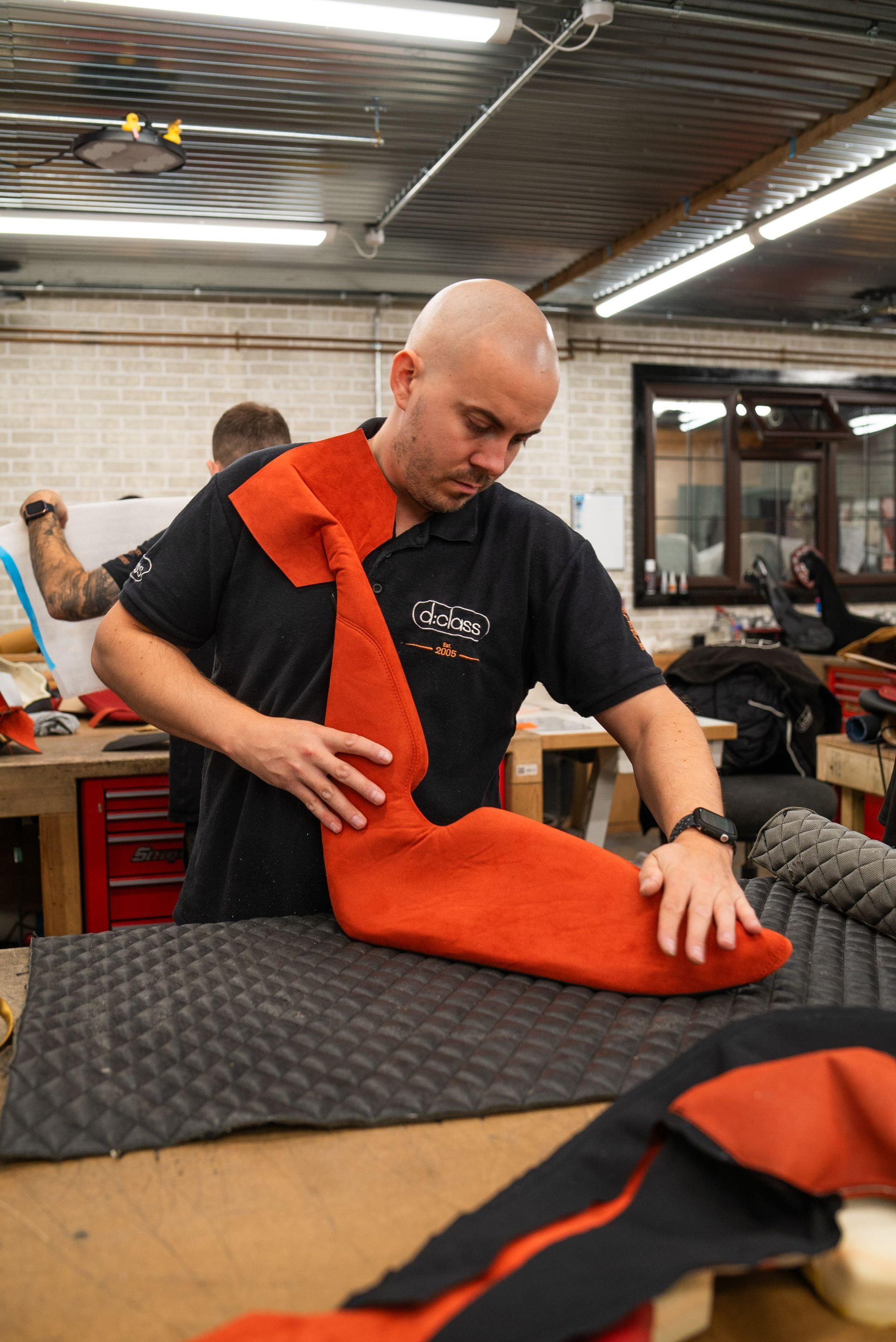 mclaren slr hdk mso volcano orange project d:class automotive retrim laser interior retrim SEMA 2024 Alcantara