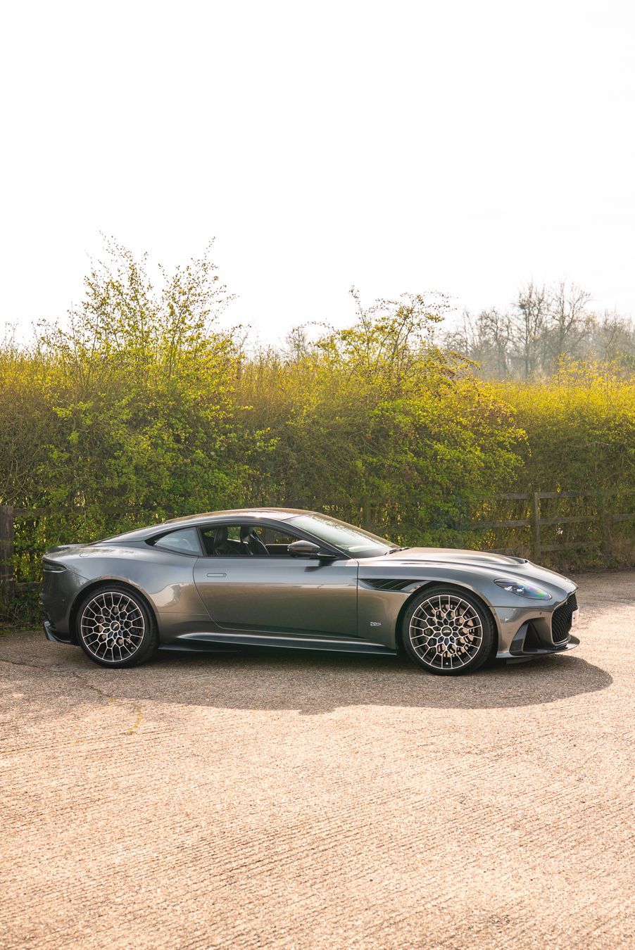aston martin DBS 770 ultimate grey metallic grey side view angle wheels portrait vertical