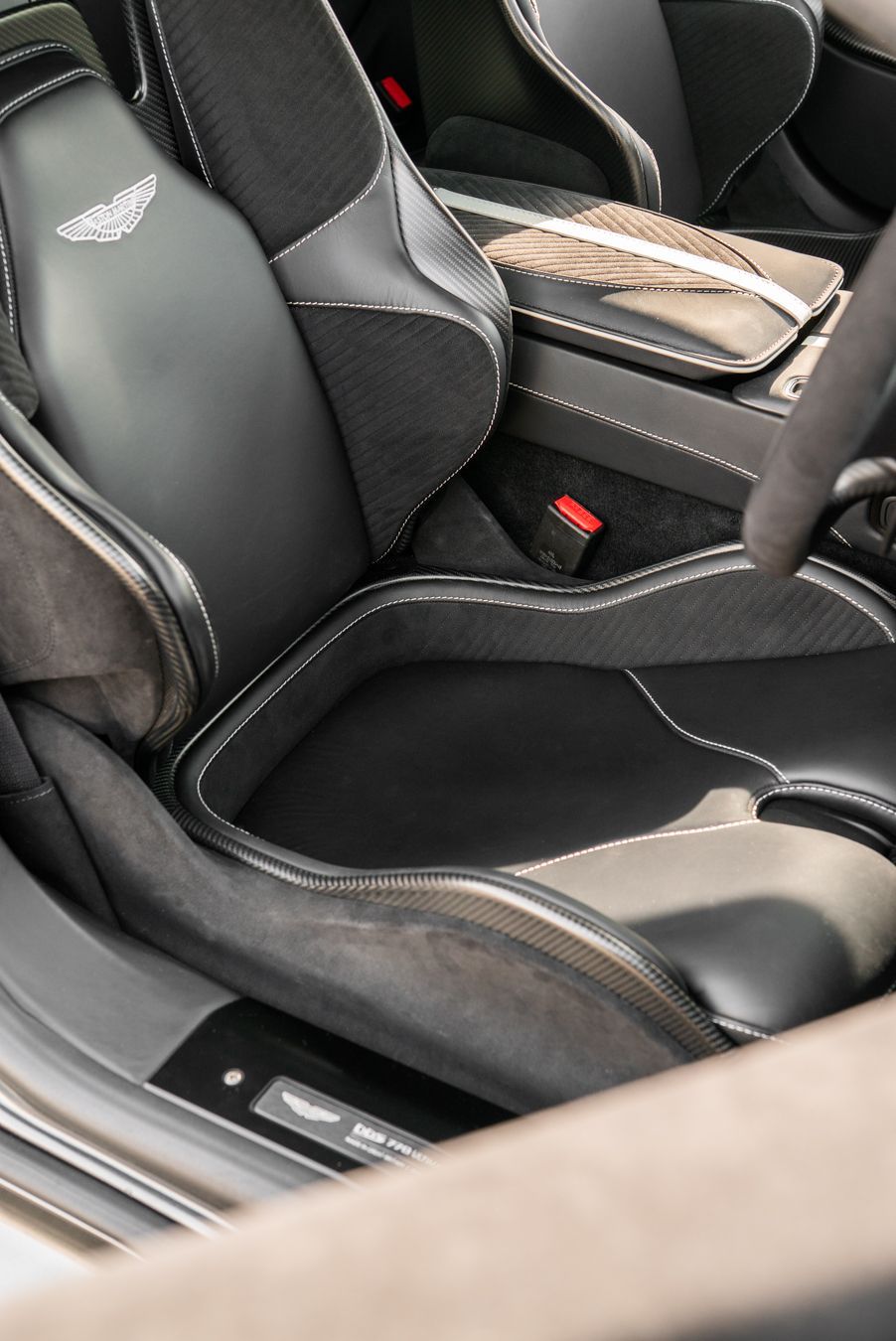 aston martin DBS 770 ultimate seat base retrim pad alcantara leather solution repair replace fix uncomfortable retrim fabricate custom bespoke d:class dclass auto automotive upholster upholstery