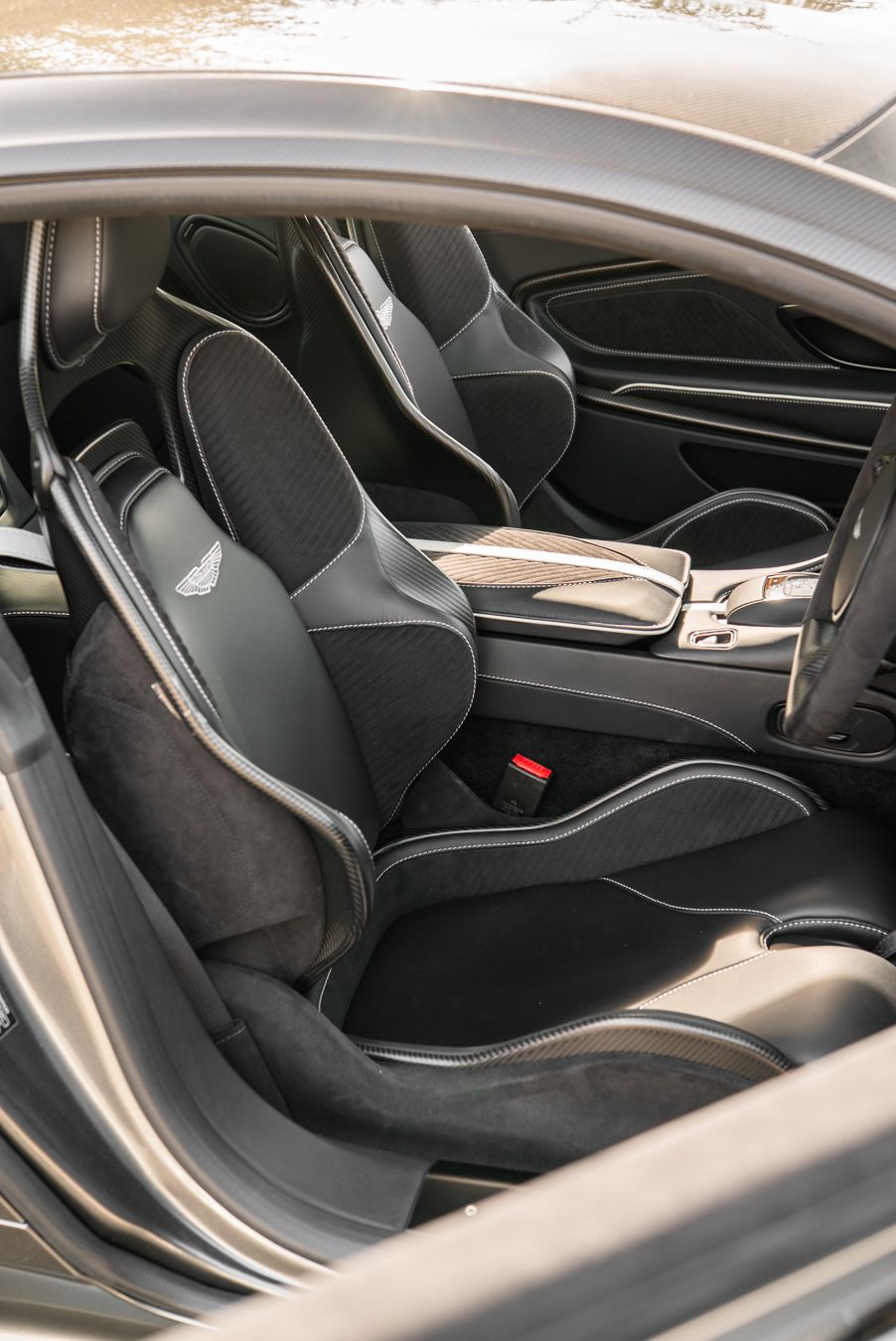aston martin DBS 770 ultimate seat base retrim pad alcantara leather solution repair replace fix uncomfortable retrim fabricate custom bespoke d:class dclass auto automotive upholster upholstery