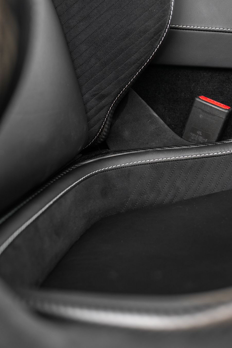 aston martin DBS 770 ultimate seat base retrim pad alcantara leather solution repair replace fix uncomfortable retrim fabricate custom bespoke d:class dclass auto automotive upholster upholstery