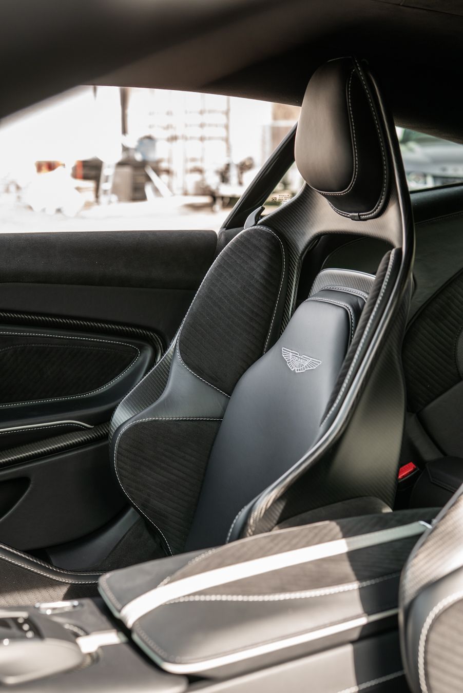 aston martin DBS 770 ultimate grey metallic interior black leather alcantara seat seats carbon fibre shells d:class dclass pads embroidery 