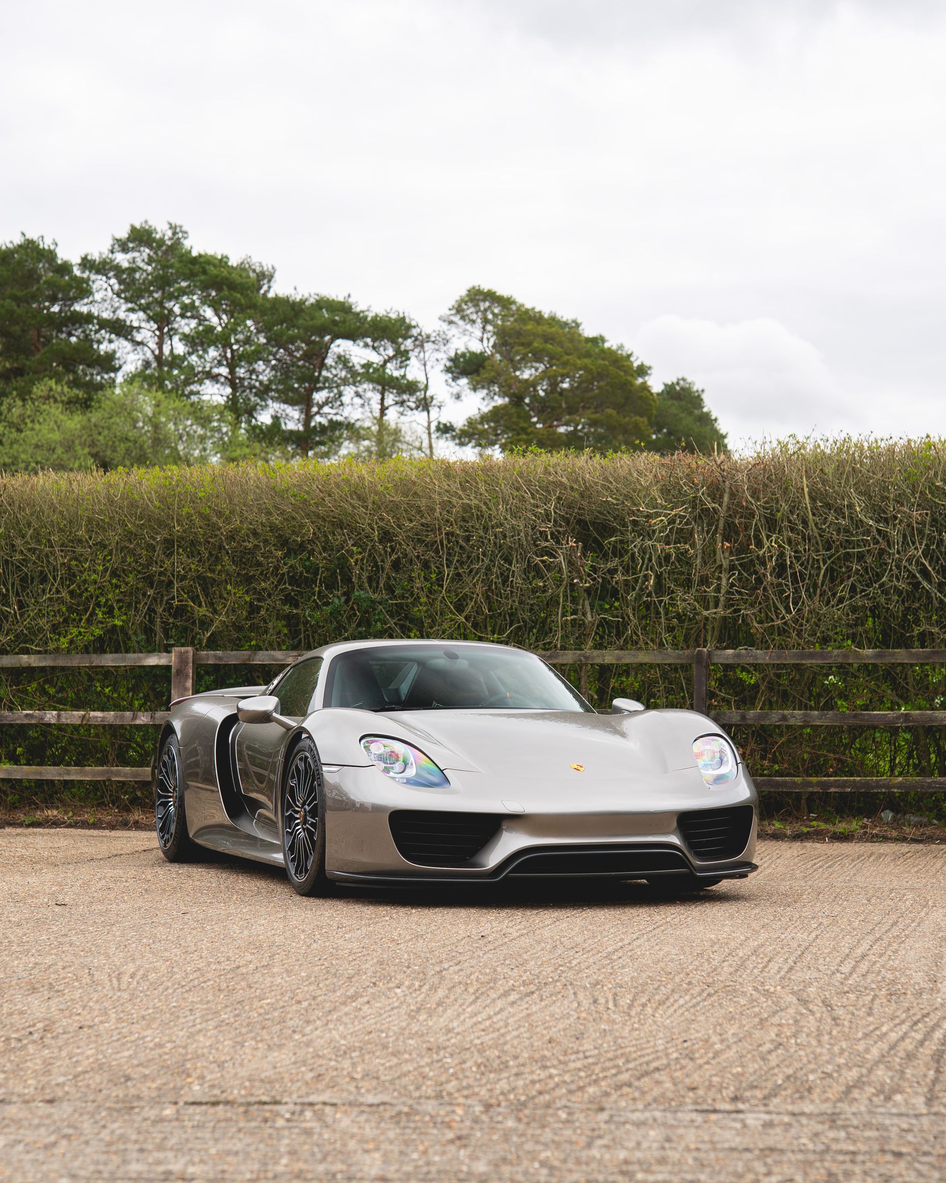 porsche 918 spyder steering wheel retrim black nappa leather orange racing band d:class dclass auto automotive near me interior stitch stitching oem 