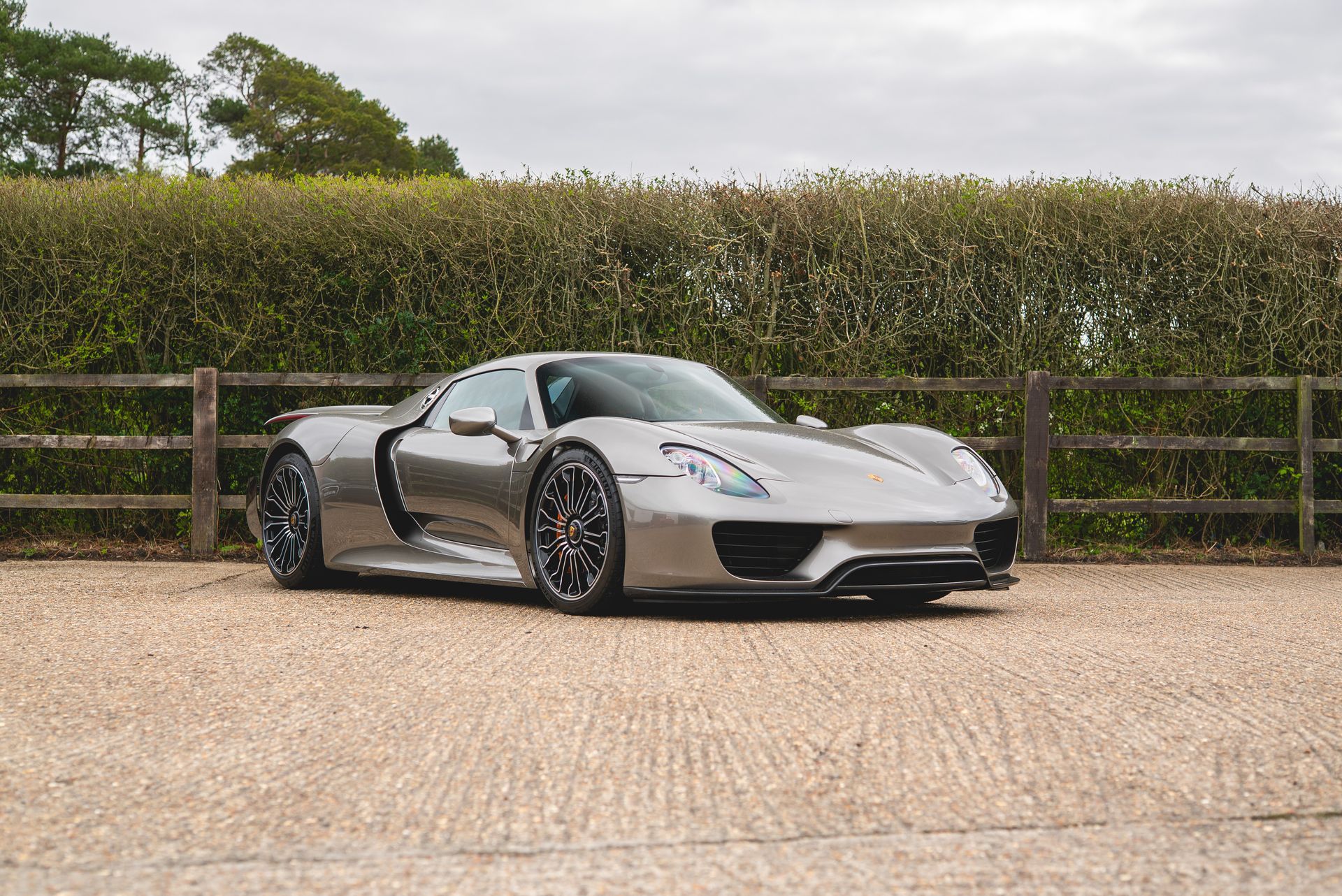 porsche 918 spyder steering wheel retrim black nappa leather orange racing band d:class dclass auto automotive near me interior stitch stitching oem 