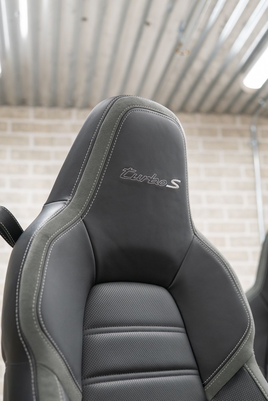 Porsche 911 Turbo S seat retrim leather alcantara embroidery logo oem upholstery reupholster near me dclass d:class