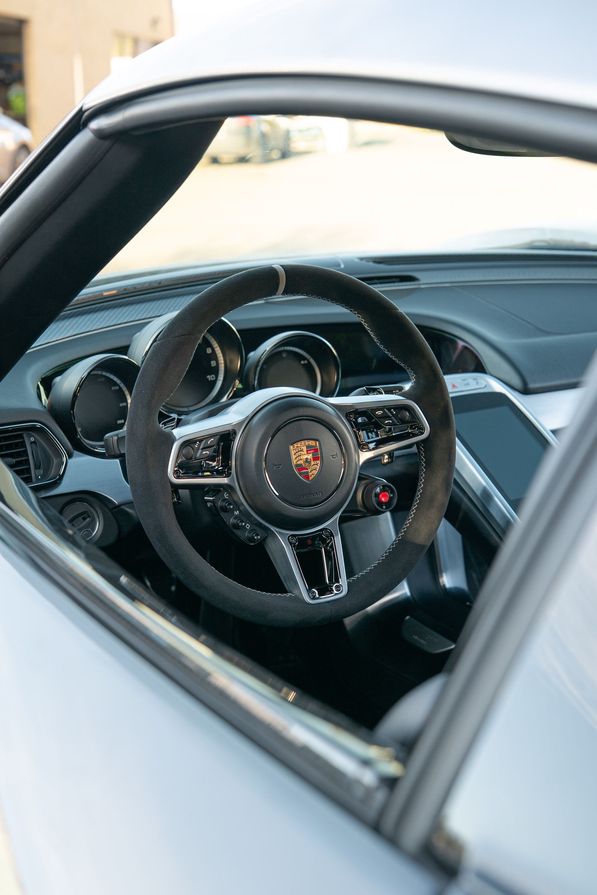 porsche 918 spyder steering wheel retrim interior alcantara dinamica race tex stitching stitch black silver d:class upholstery reupholstered surrey