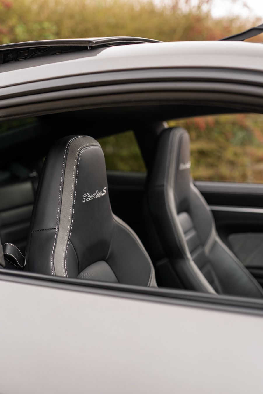 Porsche 911 Turbo S seat retrim leather alcantara embroidery logo oem upholstery reupholster near me dclass d:class