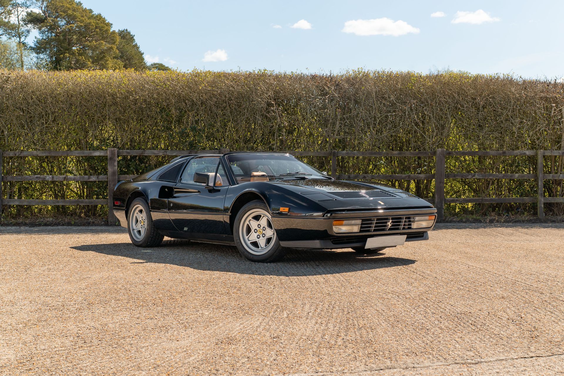 Ferrari 328 GTS interior retrim repairs leather seats sseat carpet targa open air convertible vehicle upholstery trim recover tan beige d:class dclass auto automotive