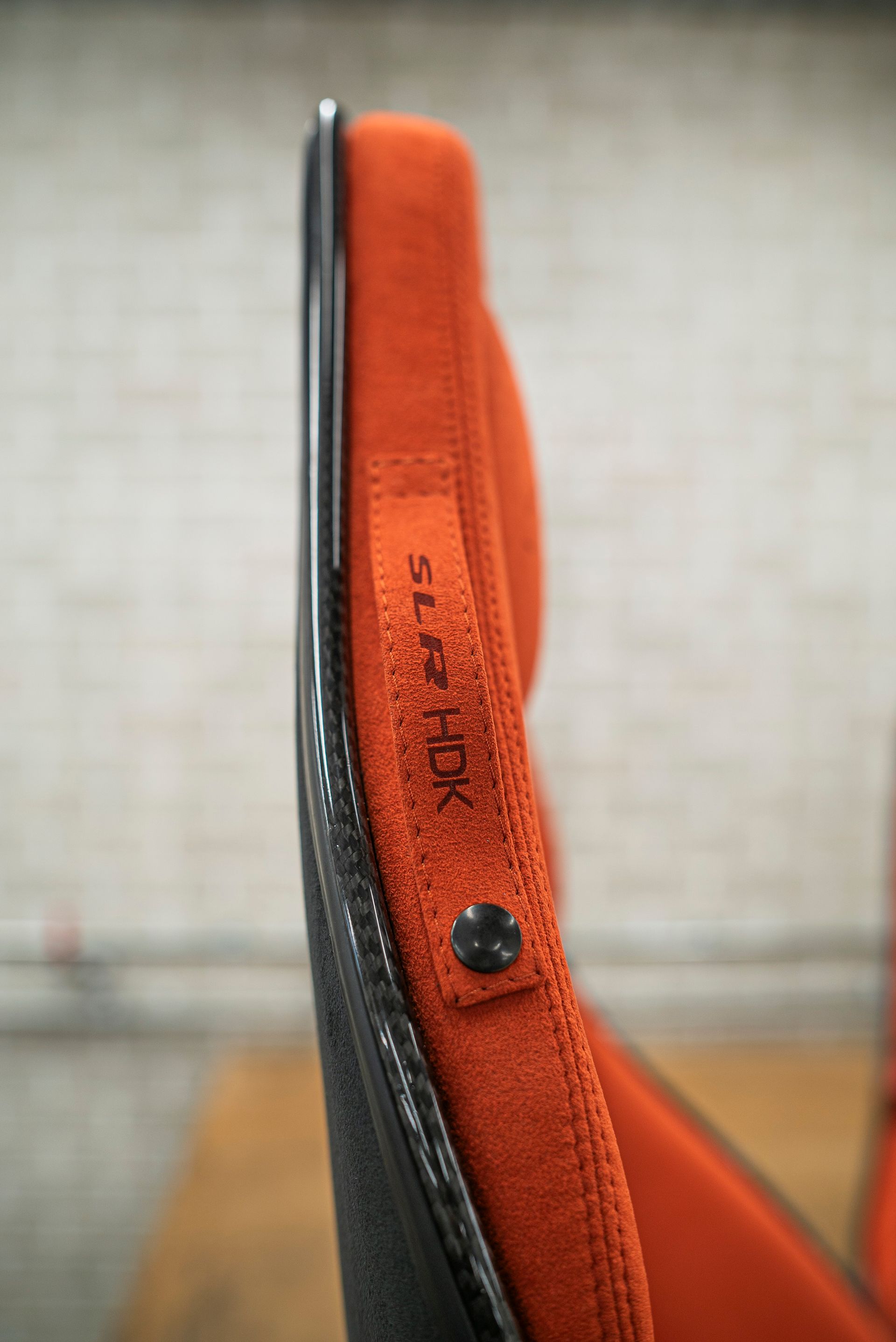 mclaren MSO SLR HDK Interior retrim restoration volcano orange alcantara laser tartan lasered sema 2024 las vegas d:class automotive