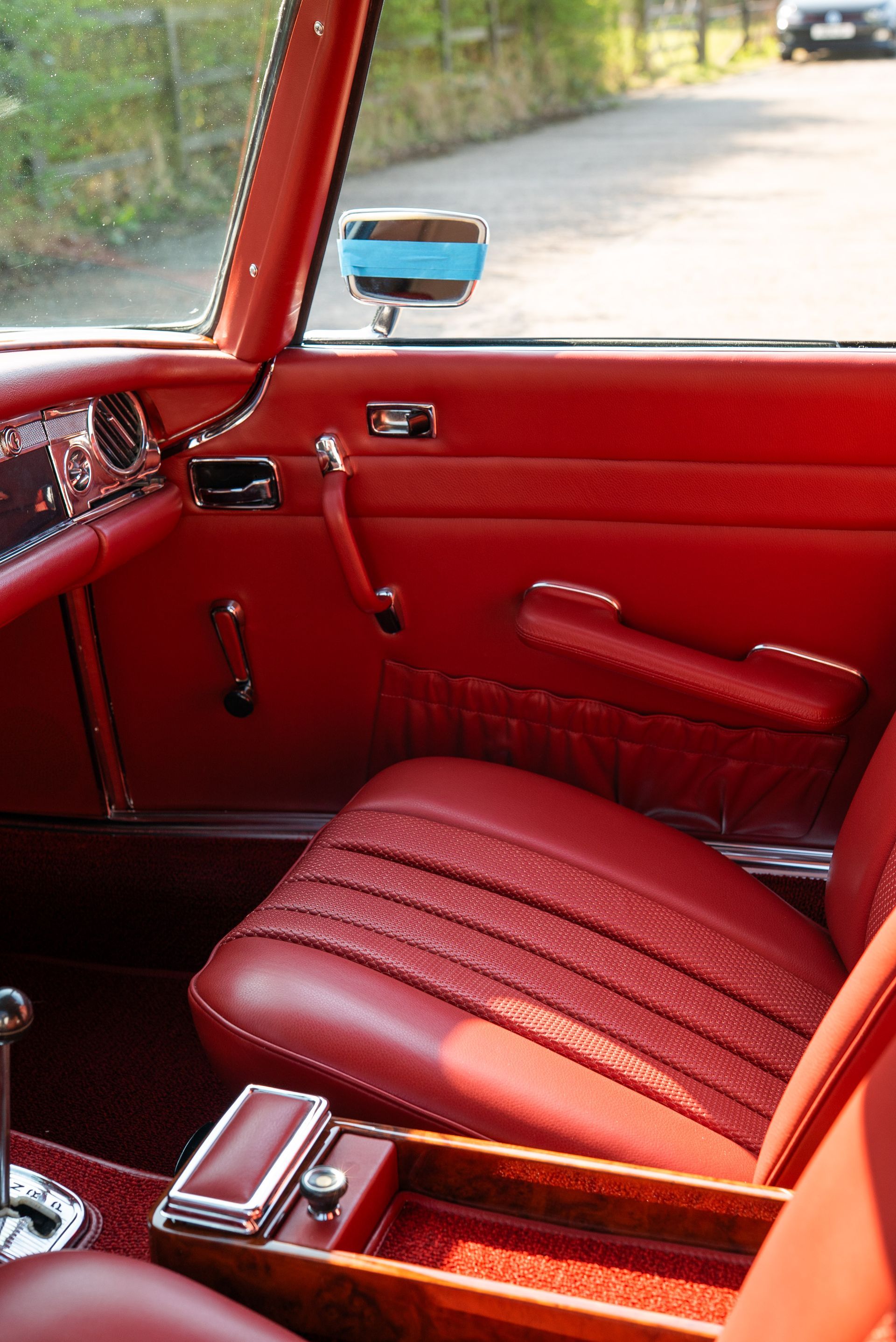 Mercedes-Benz W113 red old timer leather uk hide d:class basket weave box carpet retrim restoration upholstery reupholstered