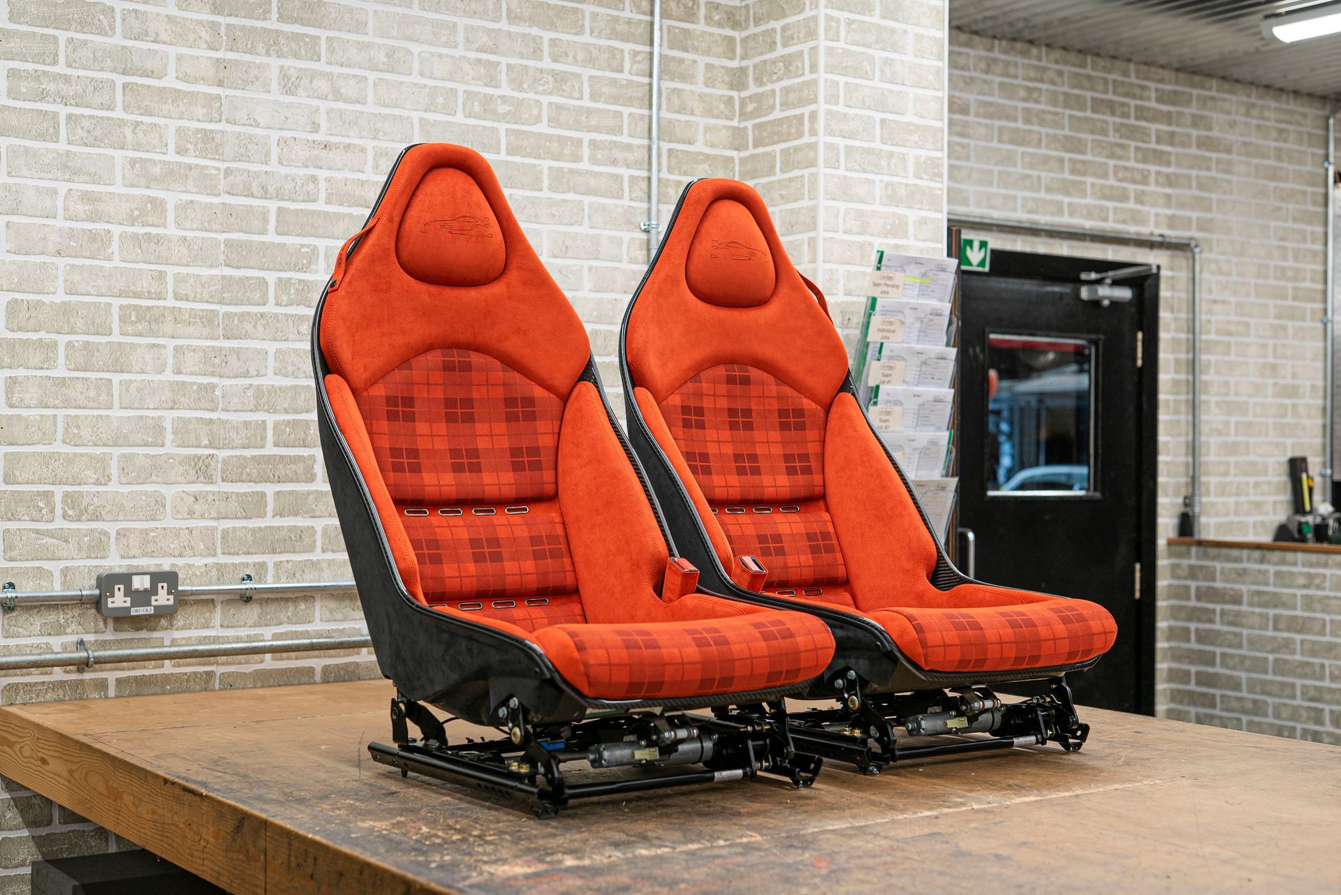 mclaren MSO SLR HDK Interior retrim restoration volcano orange alcantara laser tartan lasered sema 2024 las vegas d:class automotive