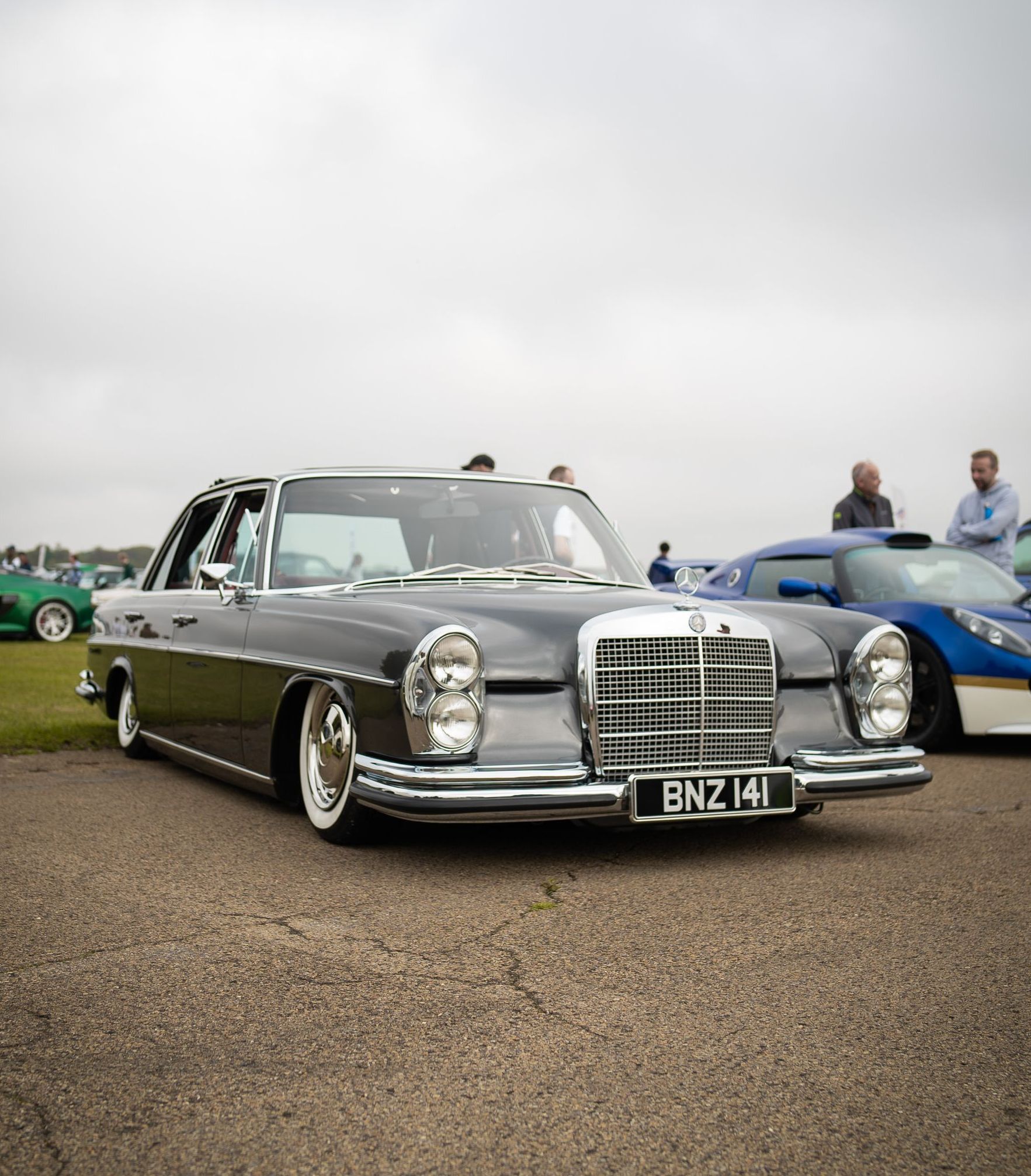 mercedes-benz W109 custom interior retrim leather distressed red d:class automotive modified grey silver bench seat seats dougie