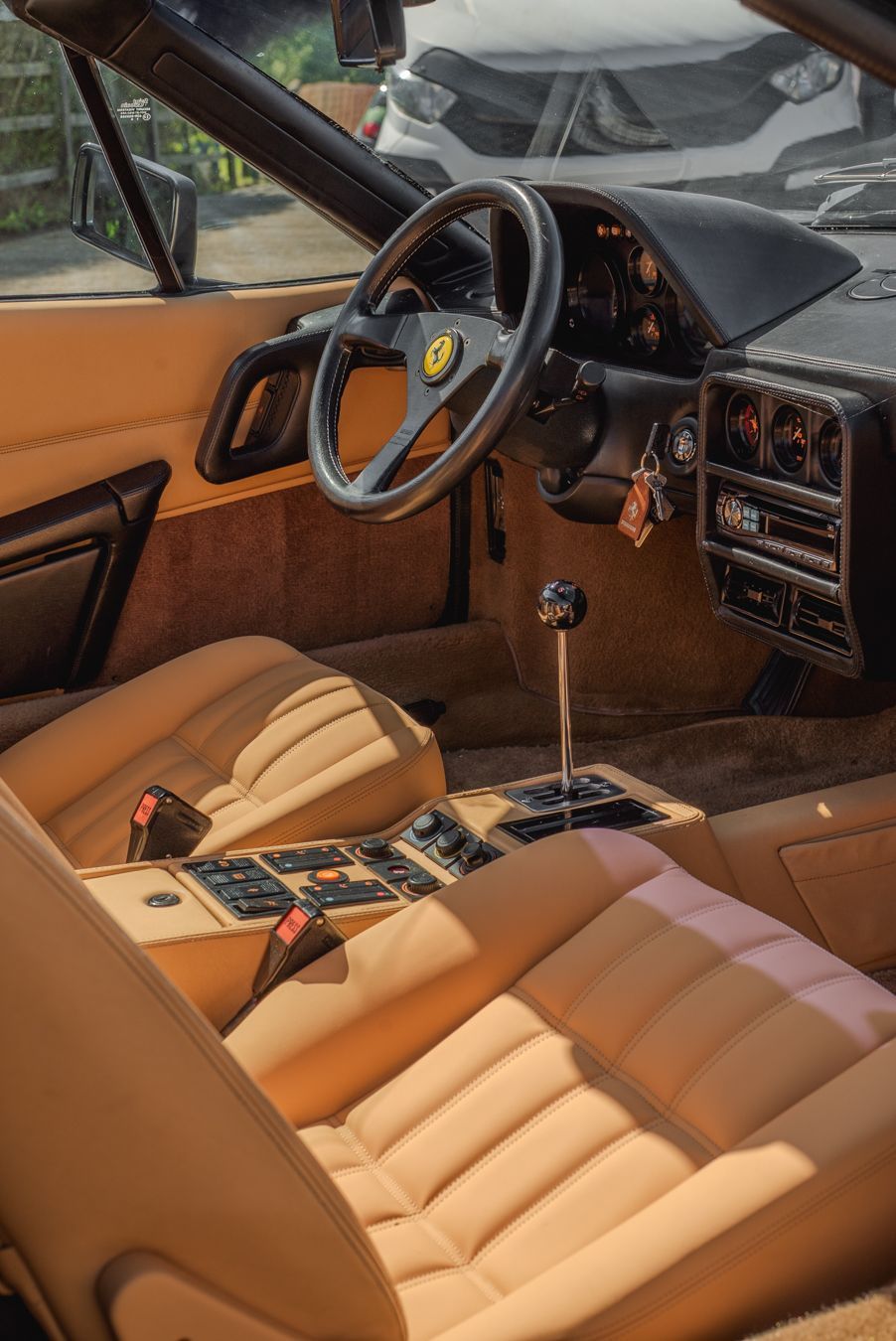 Ferrari 328 GTS interior retrim repairs leather seats sseat carpet targa open air convertible vehicle upholstery trim recover tan beige d:class dclass auto automotive