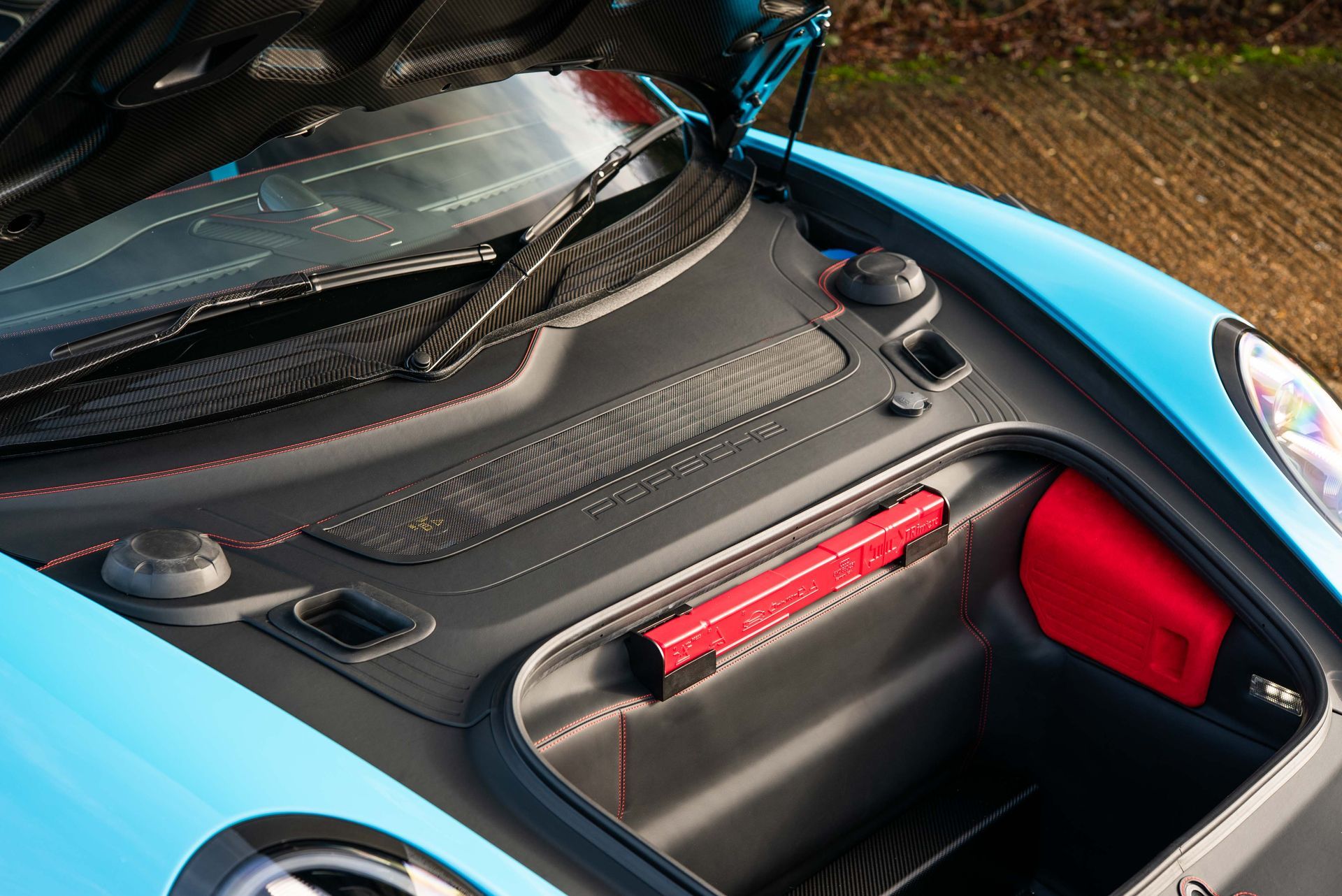 porsche 911 GT2 RS frunk bonnet plastics carpet retrim leather nappa black stitching modification custom customised alcantara d:class oem plus oem+ retrimmed upholstered reupholstered miami blue