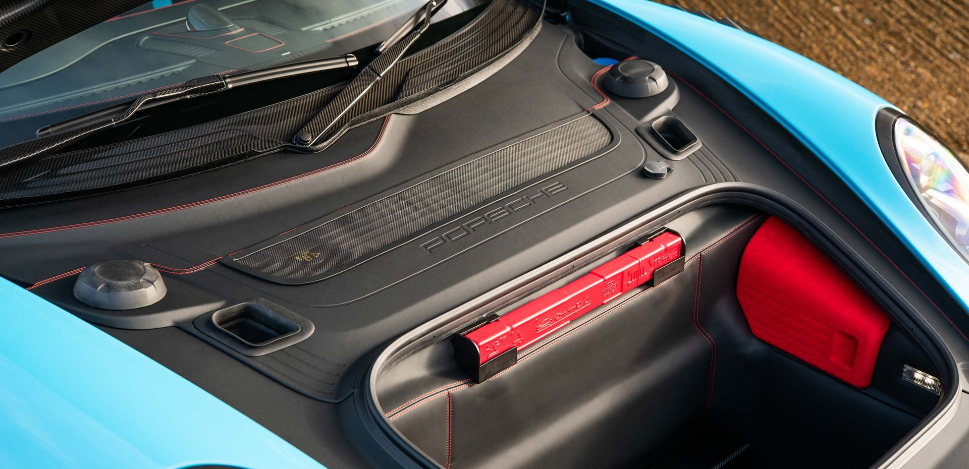 porsche 911 GT2 RS frunk bonnet plastics carpet retrim leather nappa black stitching modification custom customised alcantara d:class oem plus oem+ retrimmed upholstered reupholstered miami blue