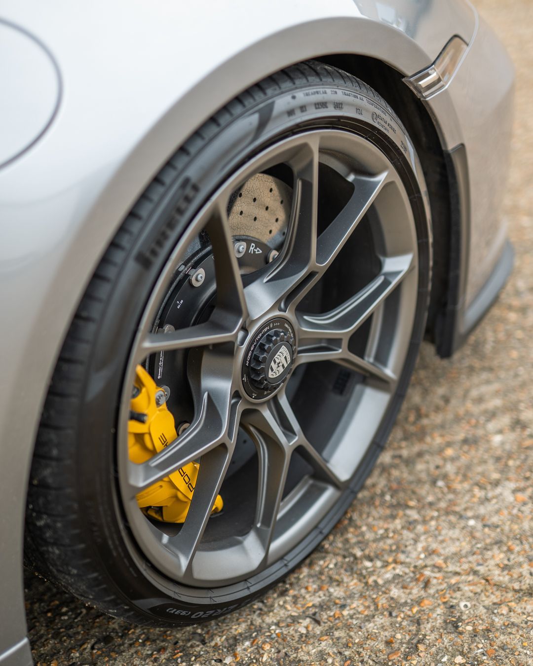 Porsche GT3 Touring silver 992.1 grey wheels yellow calipers