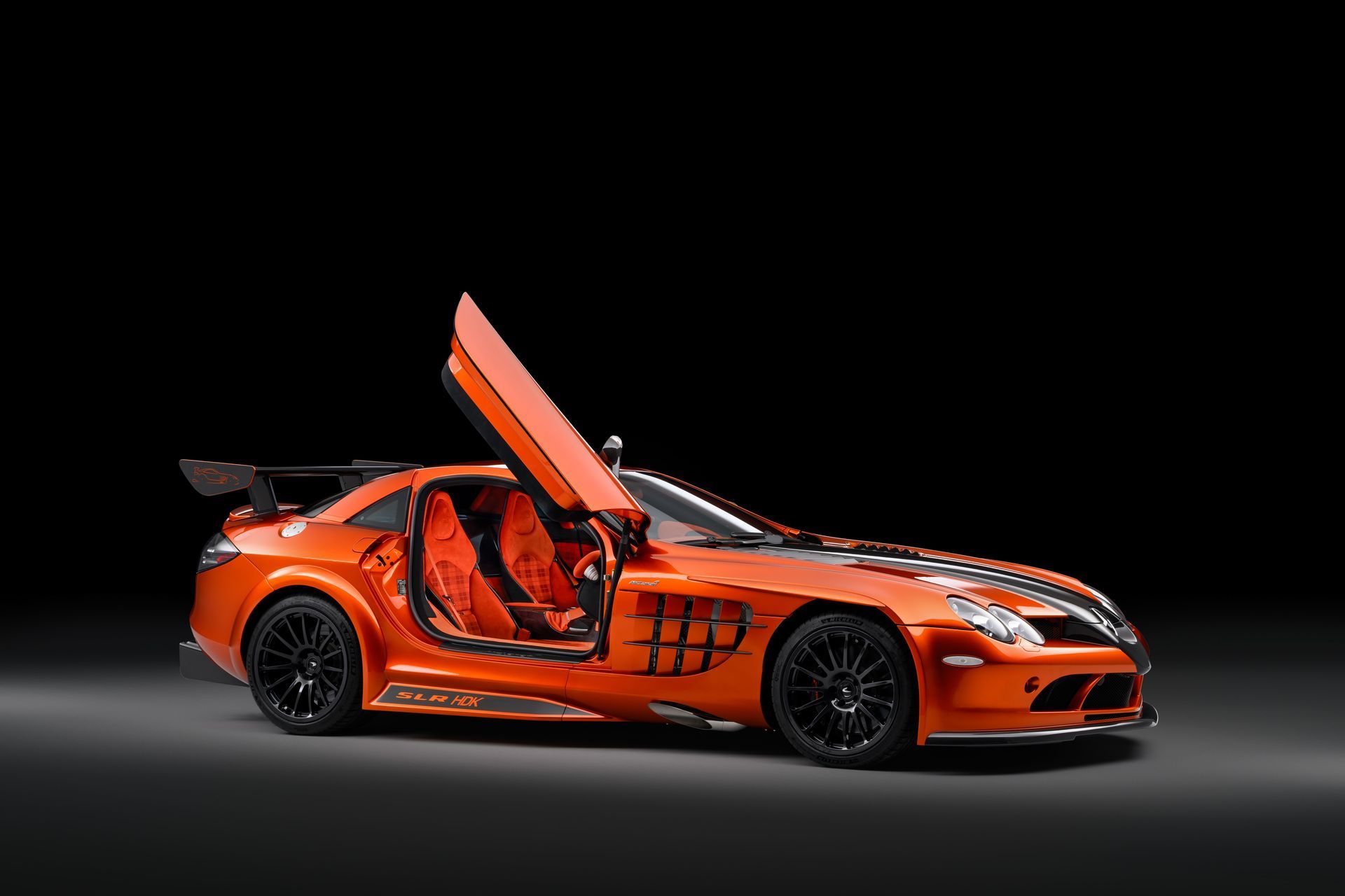 mclaren slr hdk mso volcano orange project d:class automotive retrim laser interior retrim SEMA 2024 Alcantara