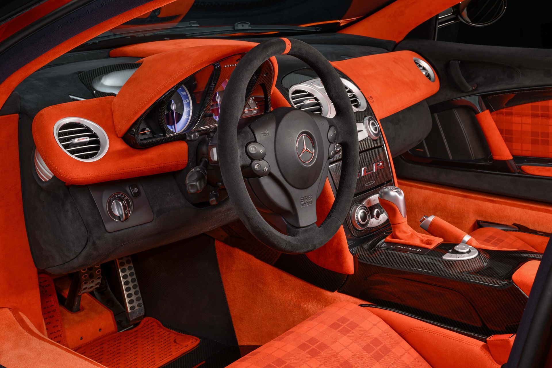mclaren slr hdk mso volcano orange project d:class automotive retrim laser interior retrim SEMA 2024 Alcantara