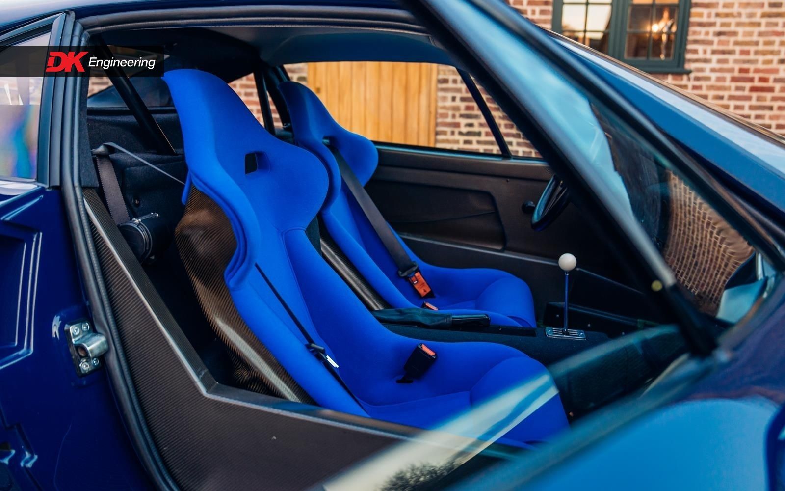 Ferrari f40 blue interior retrim restoration DK Engineering d:class automotive nomex blu santorini seat seats