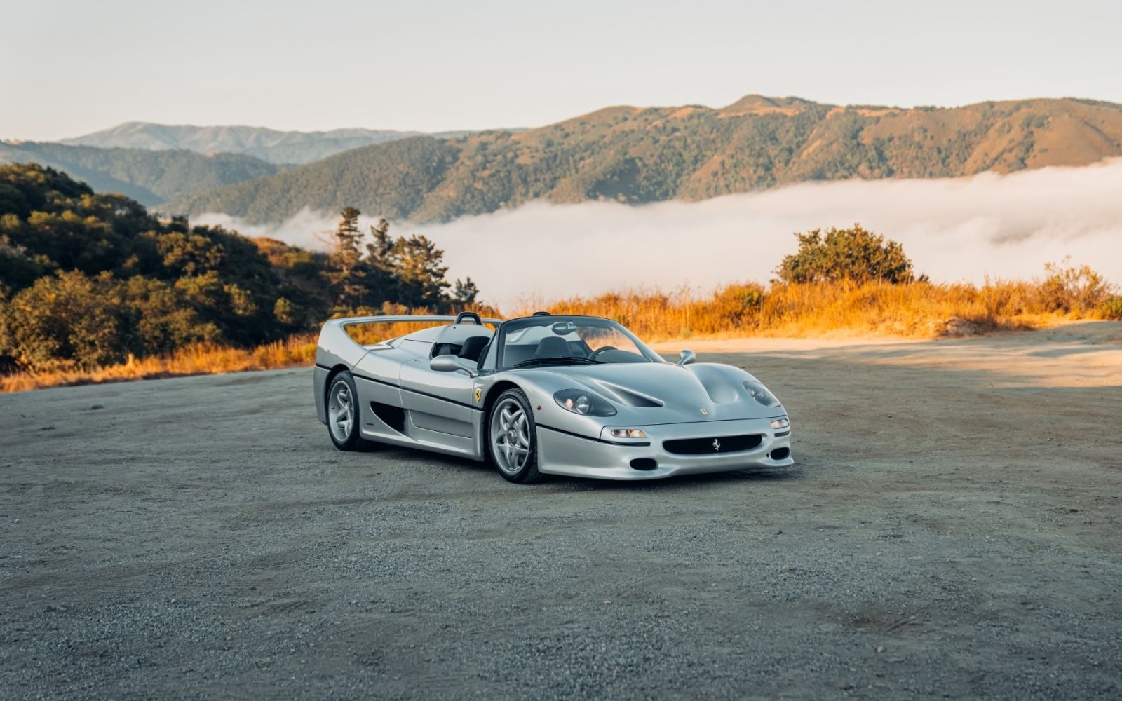 Silver Ferrari F50 DK Engineering convertible spyder monterey car week pebble beach for sale sold restoration