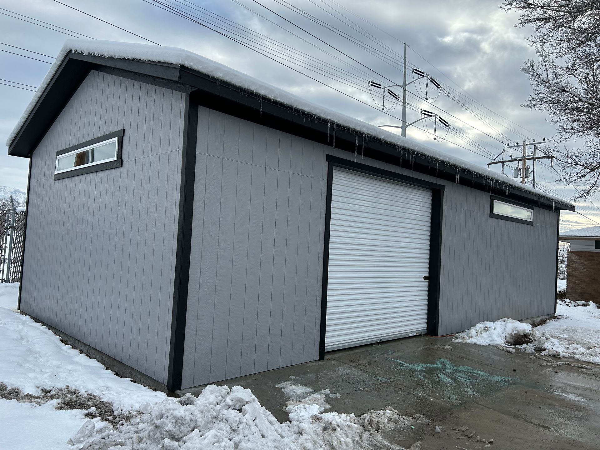 Shed On Snow With White Wide Door  — Salt Lake City, UT — Kong Sheds