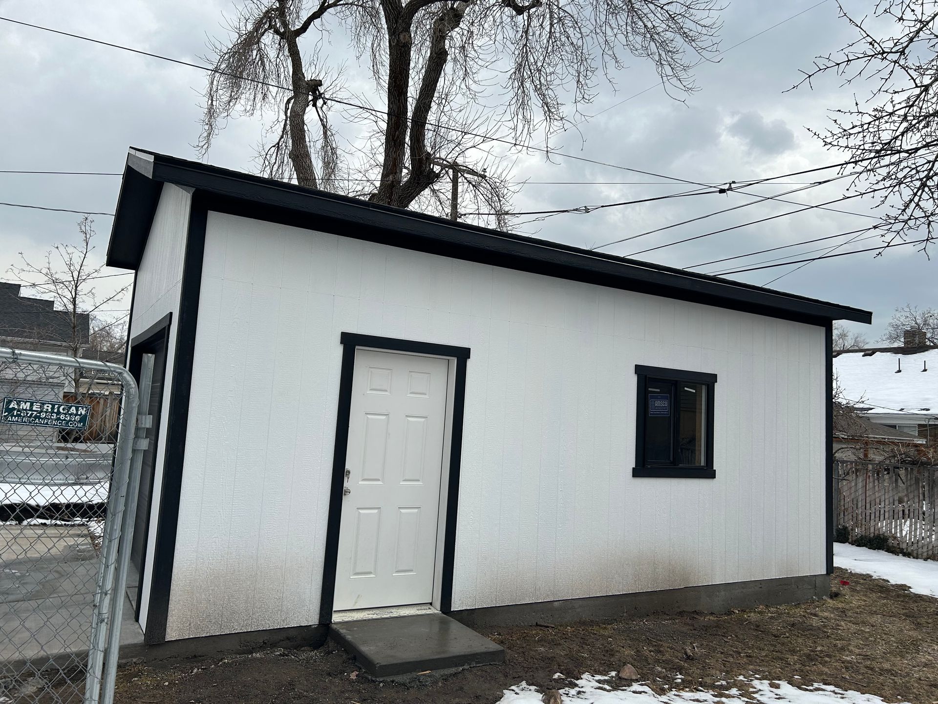 Shed On Snow With White Door  — Salt Lake City, UT — Kong Sheds