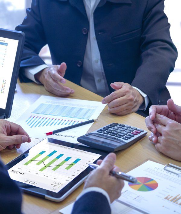 Certified Public Accountants Having a Meeting — Monroe, LA — Woodard & Associates APAC Certified Public Accountants Having a Meeting — Monroe, LA — Woodard & Associates APAC