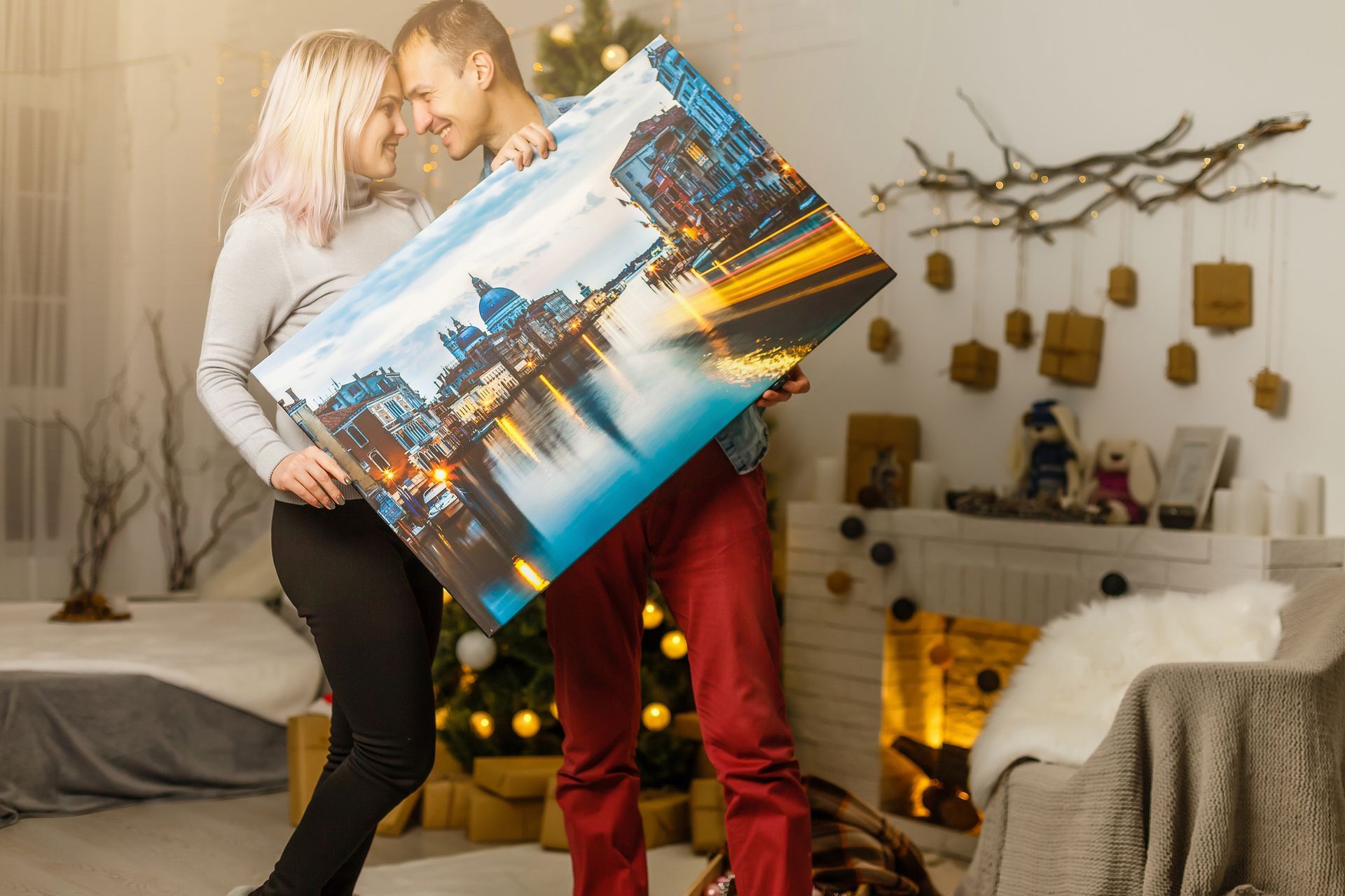 Happy Couple Holding Their Photo Canvas — Portsmouth, NH — Image Arts, Etc.