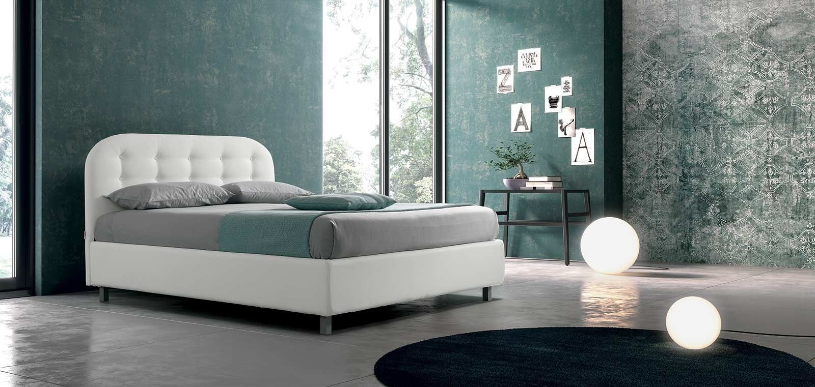 letto bianco bottoni
