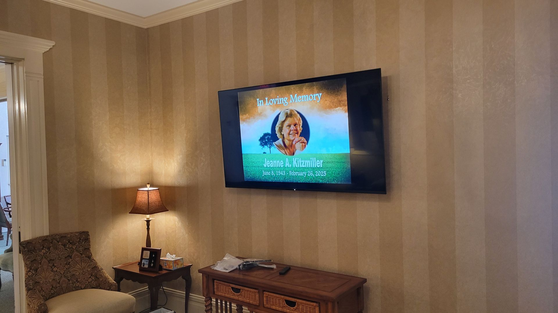 Funeral home with video system on multiple TVs in shelby ohio installed by fisher custom av.