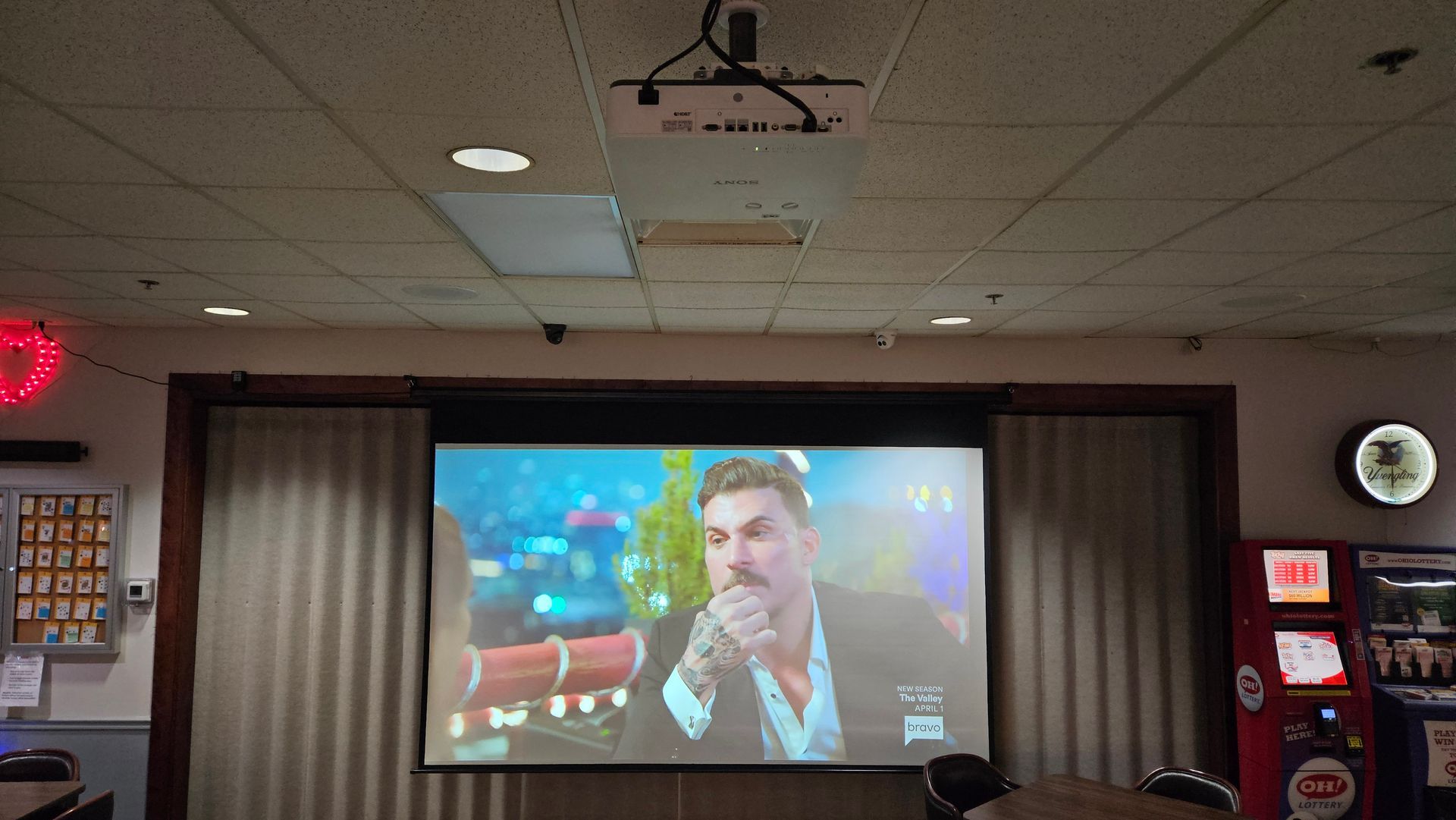 Fisher Custom AV installing large screen and laser projector in Norwalk ohio