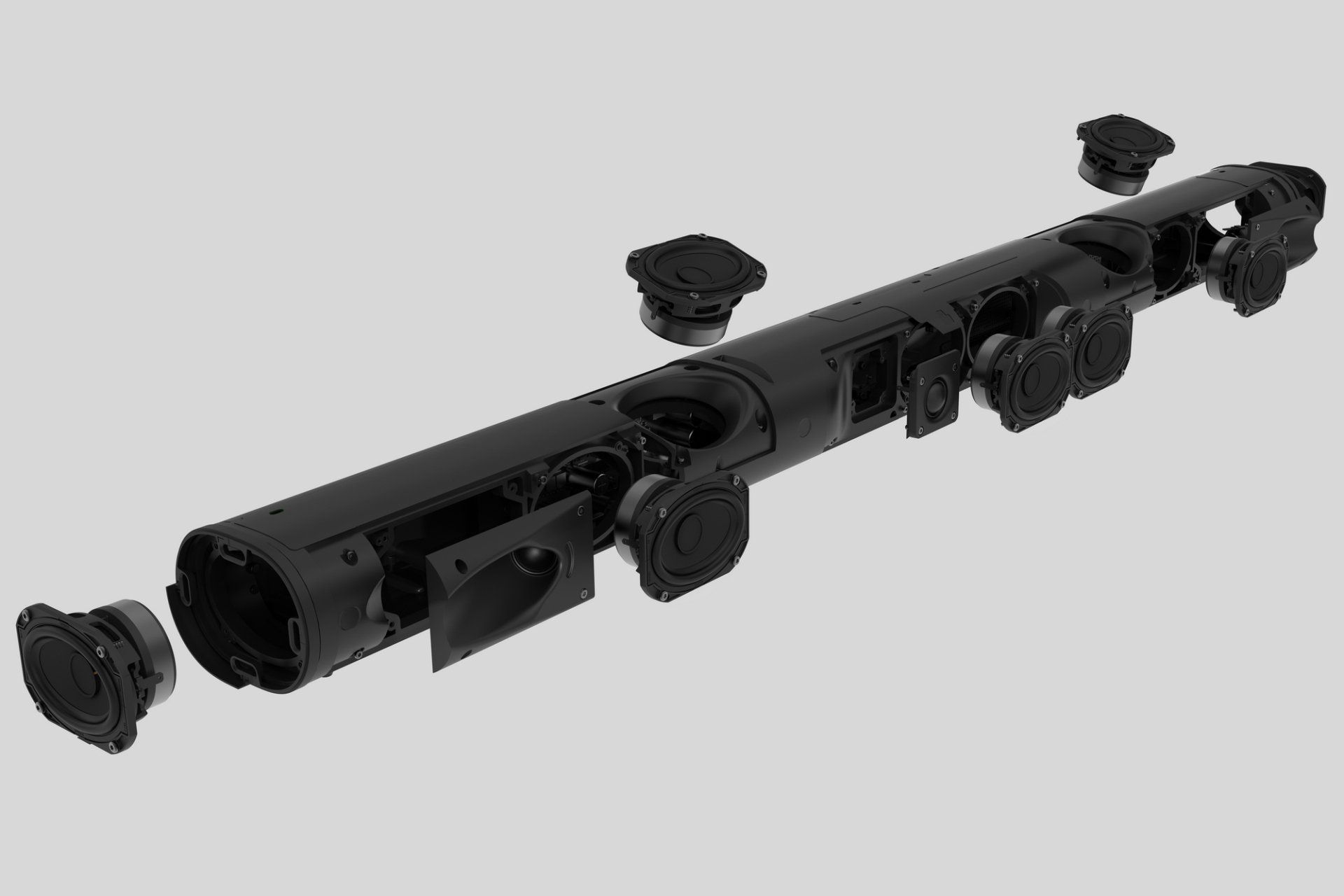 Exploded view of a sonos arc ultra soundbar, showing internal components including speakers, ports, and housing.