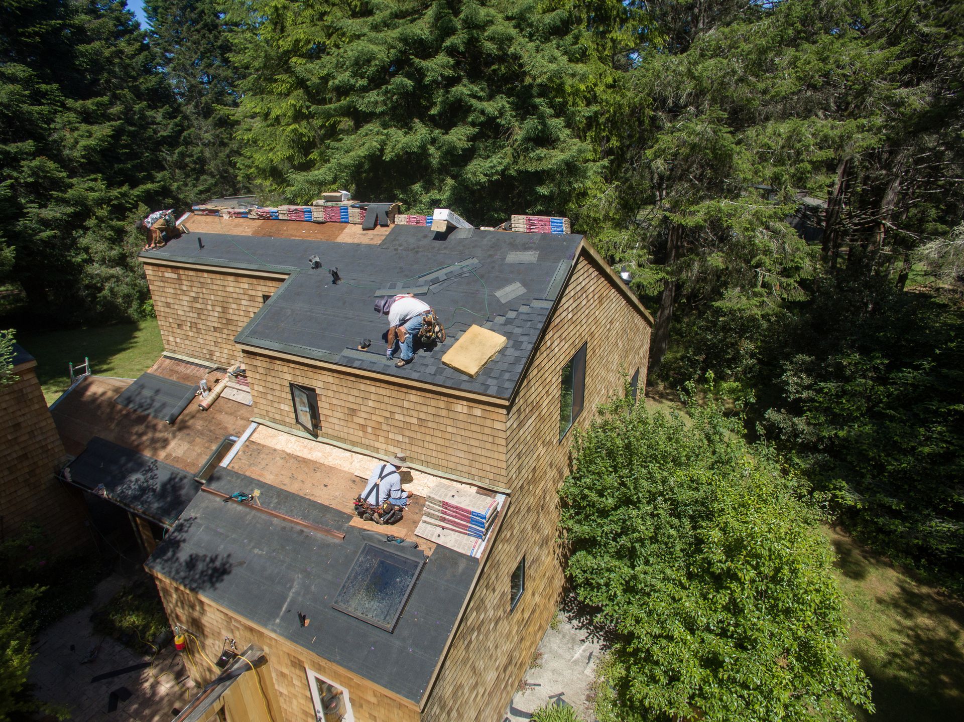 Workers installing a new roof. 