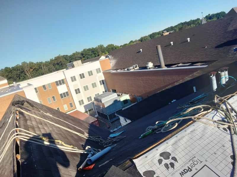 An aerial view of a roof with a piece of paper that says paw on it