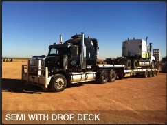 Semi truck with drop deck