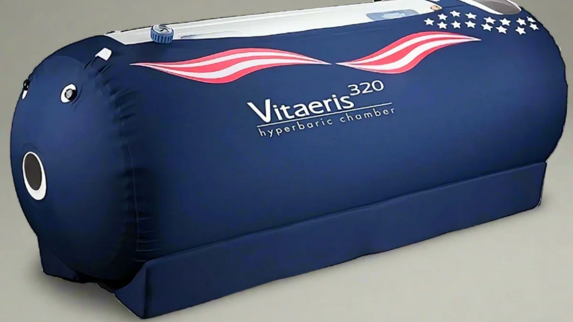 A blue vitaeris 300 oxygen chamber on a white background