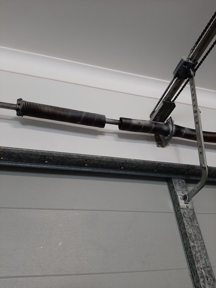 Garage Door Spring — Garage Door Maintenance in Gold Coast