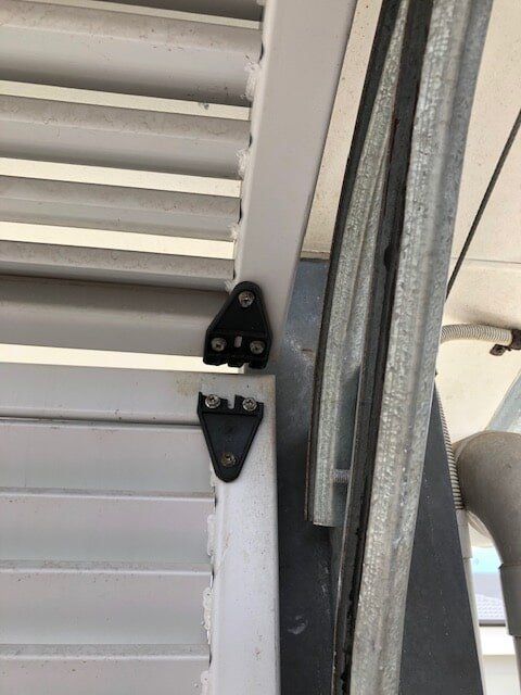 Garage Door Door Hinge Repair — Garage Door Maintenance in Gold Coast