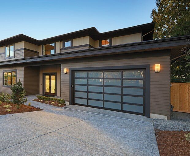 Brown Siding And Glass Garage Door — Garage Door Maintenance in Gold Coast