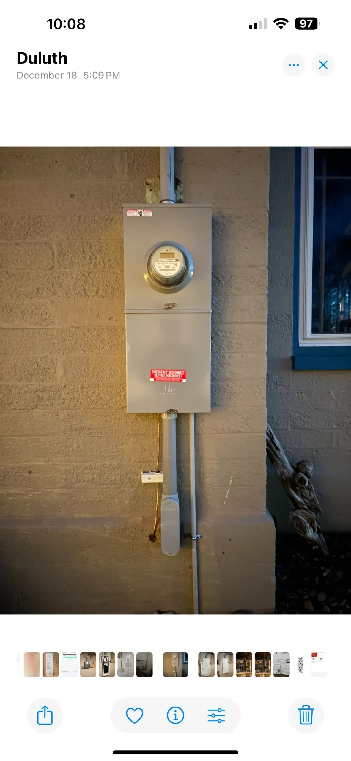 A picture of a meter on a wall on a phone.