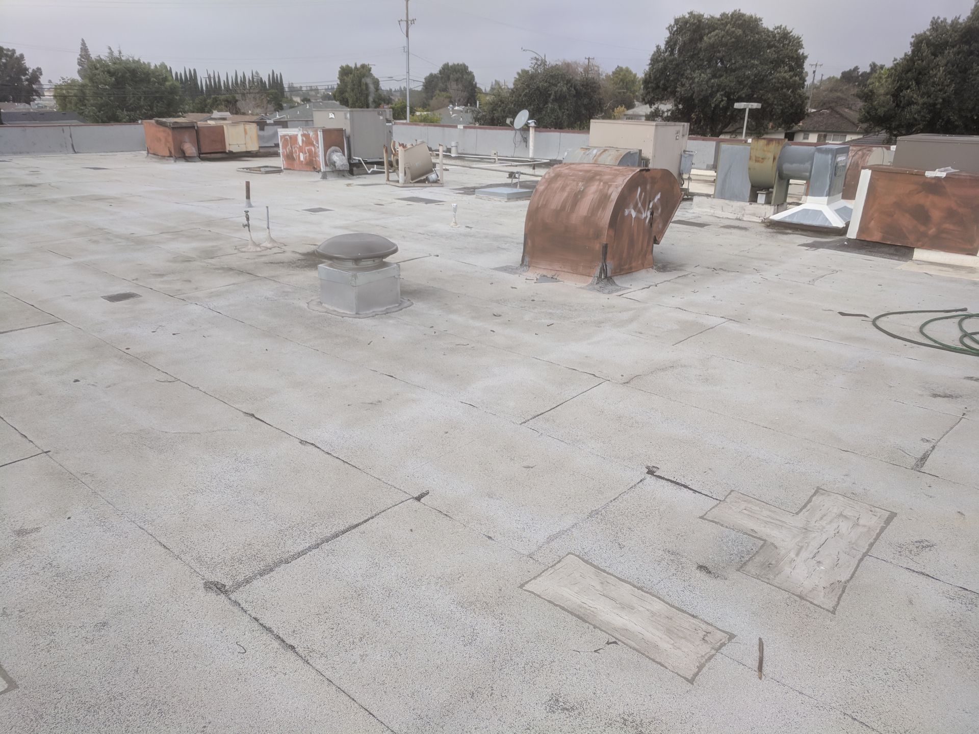 A roof with a few pieces of wood on it