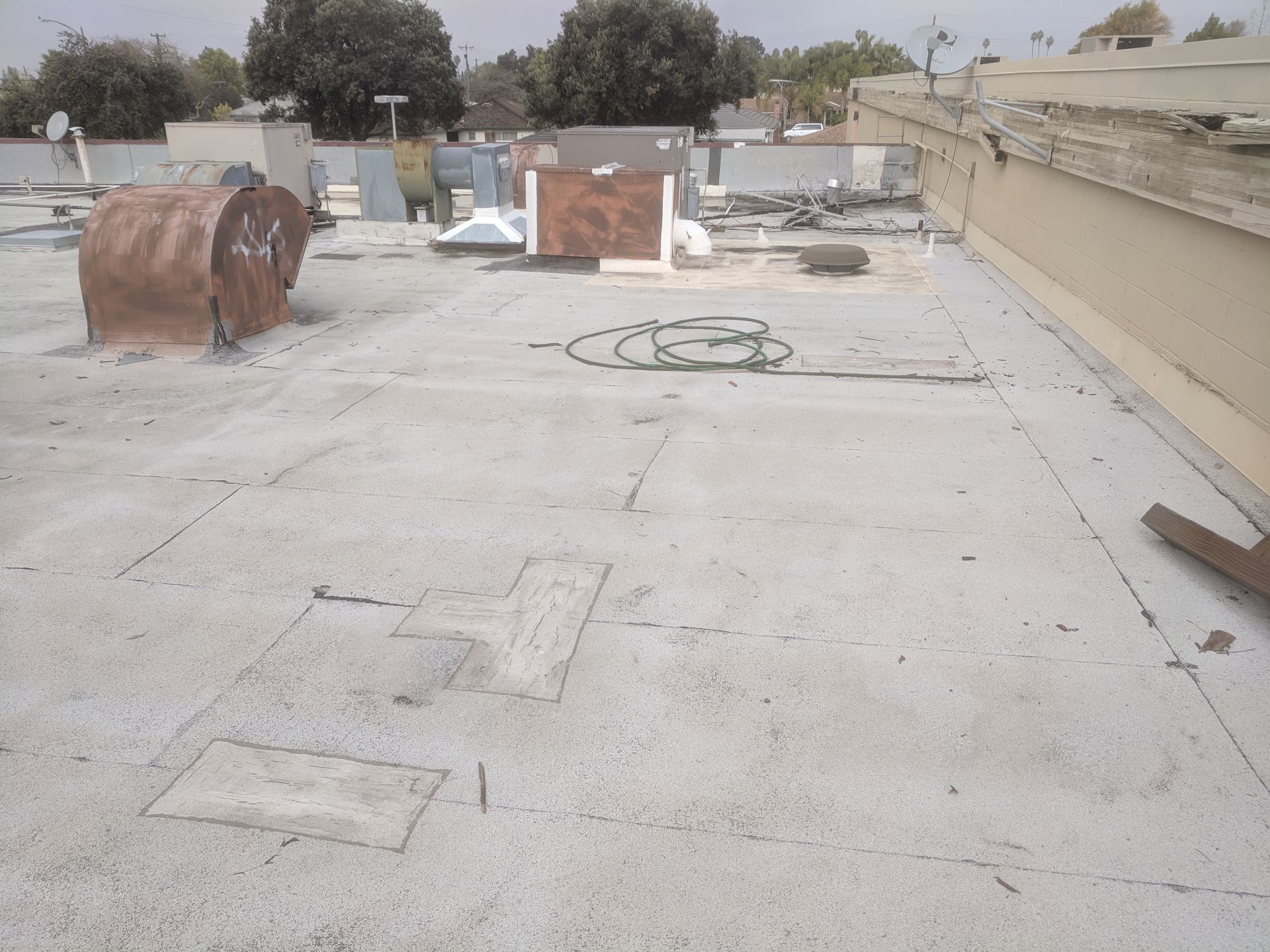 The roof of a building has a few holes in it