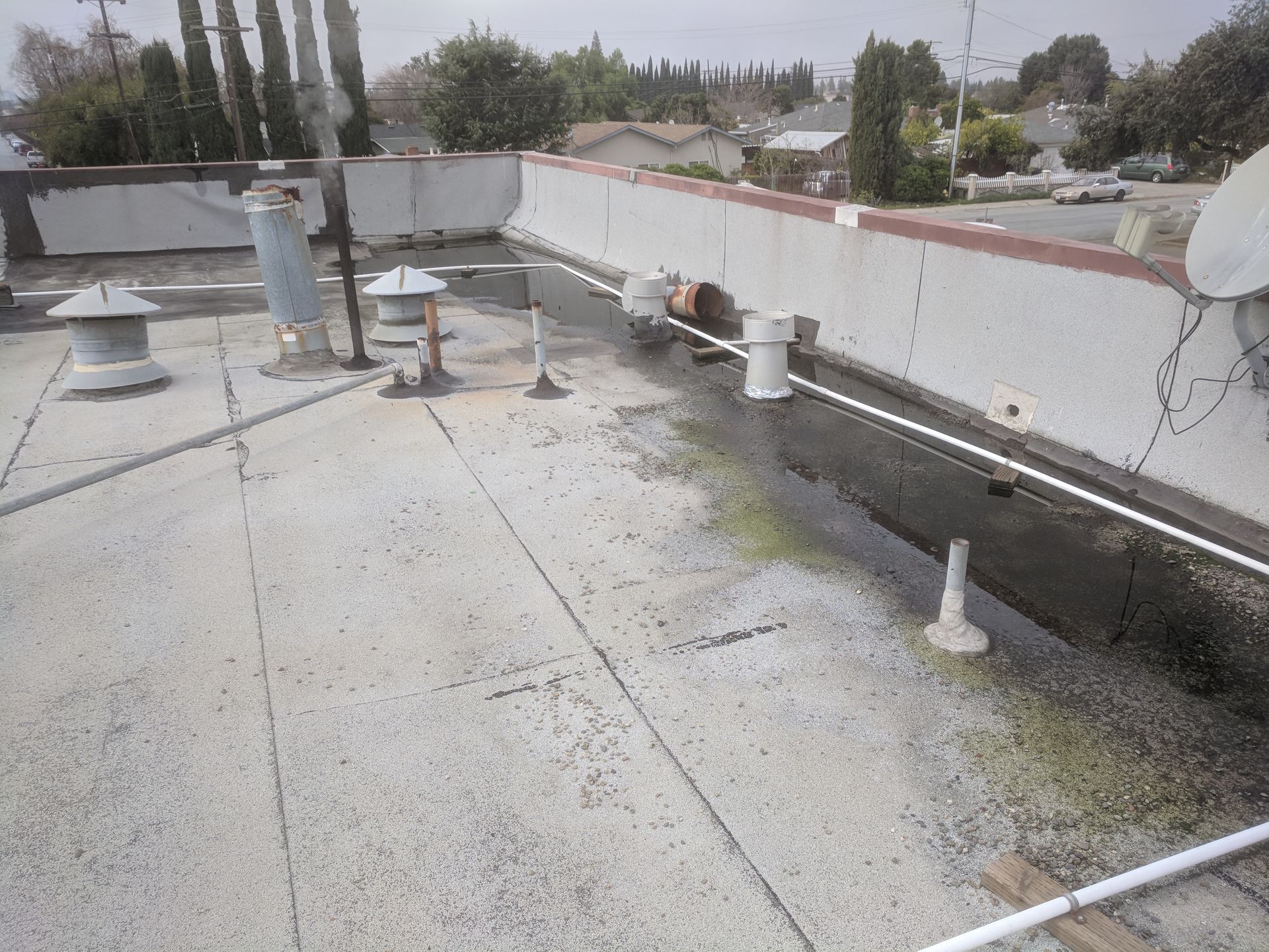 A roof with a lot of pipes on it