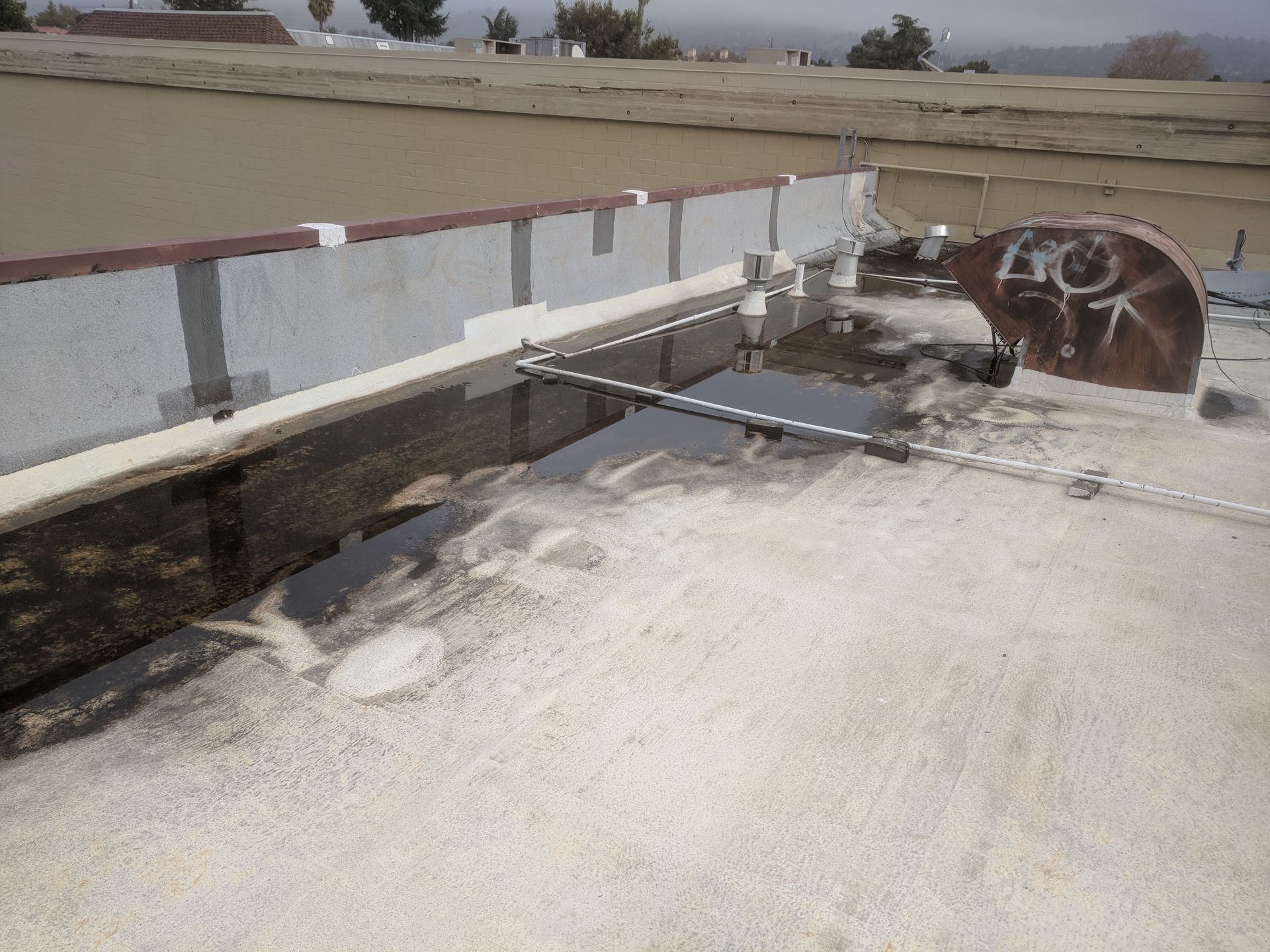 A roof with graffiti on it that says ao on it