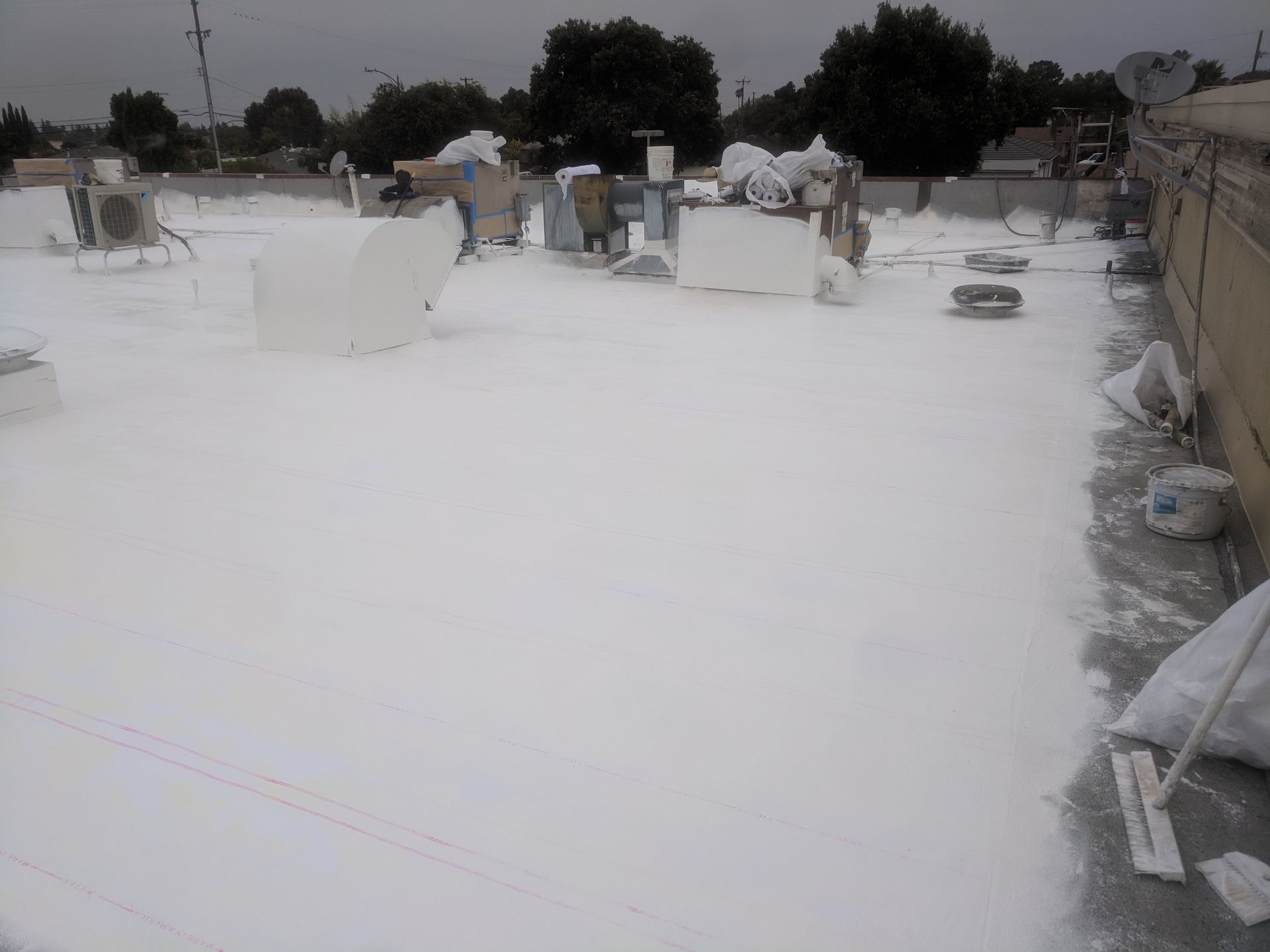 A roof with a lot of white paint on it