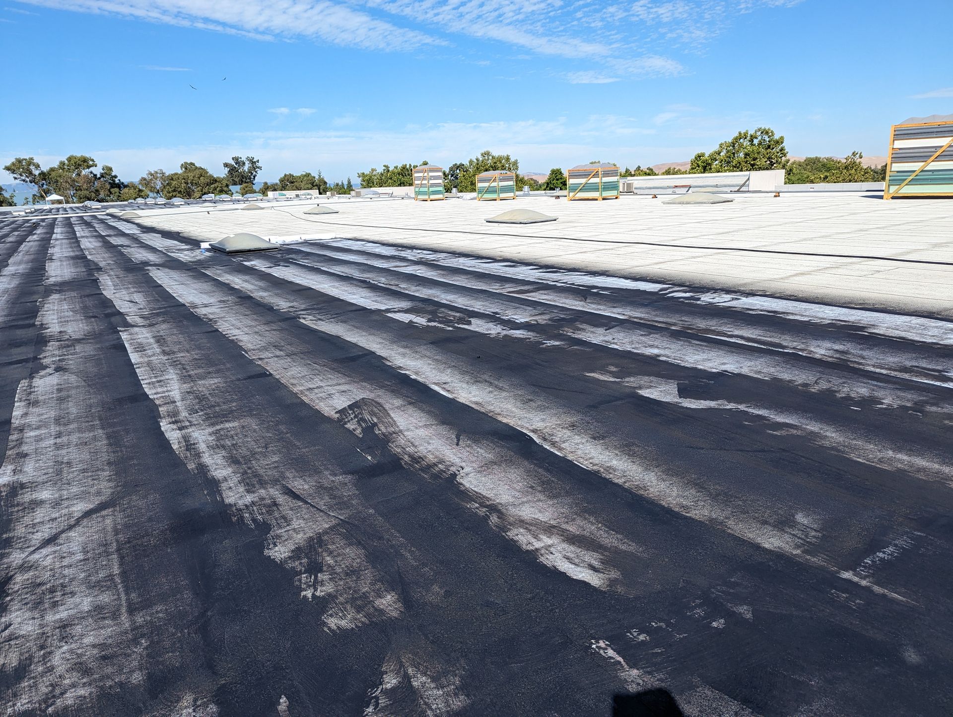 A roof with a lot of asphalt on it