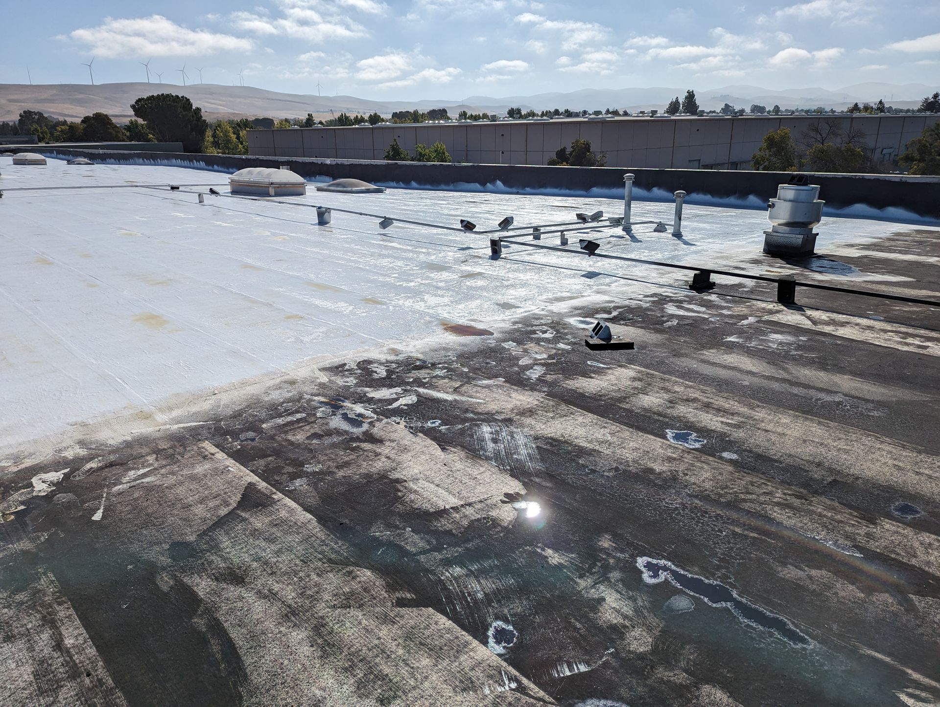A roof with a lot of water on it